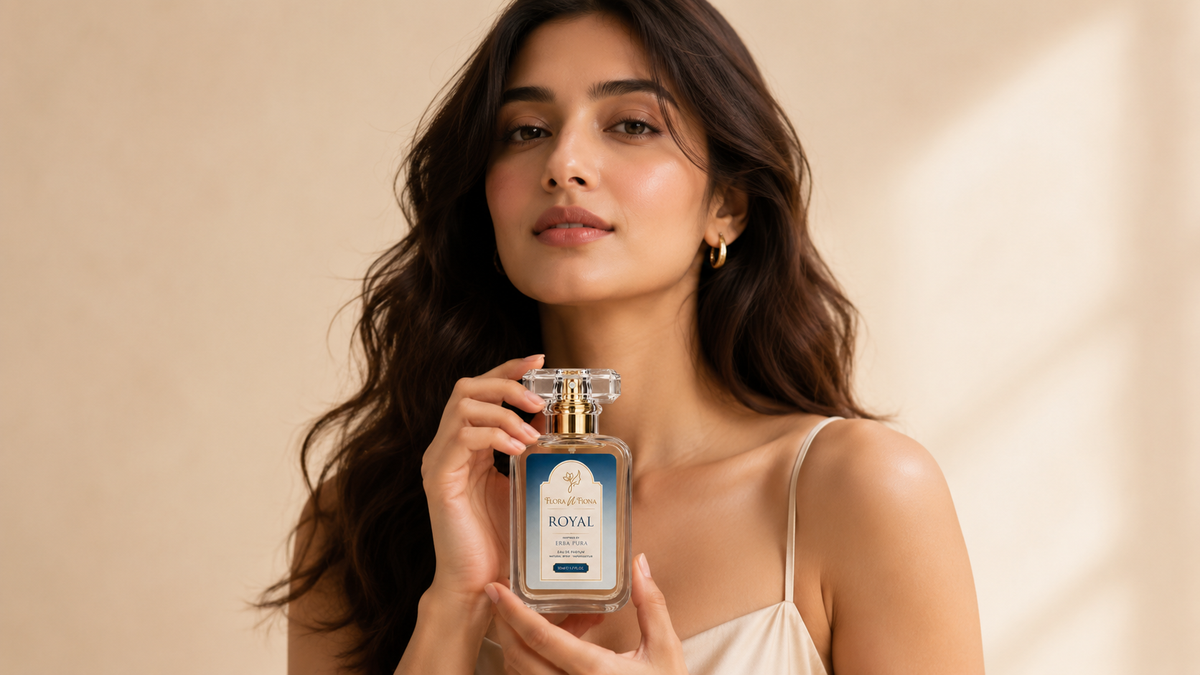 Confident woman holding Flora N Fiona Royal perfume, luxury fragrance for women in Pakistan
